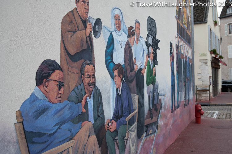 There were benches in front of this mural and we ate our croissants!